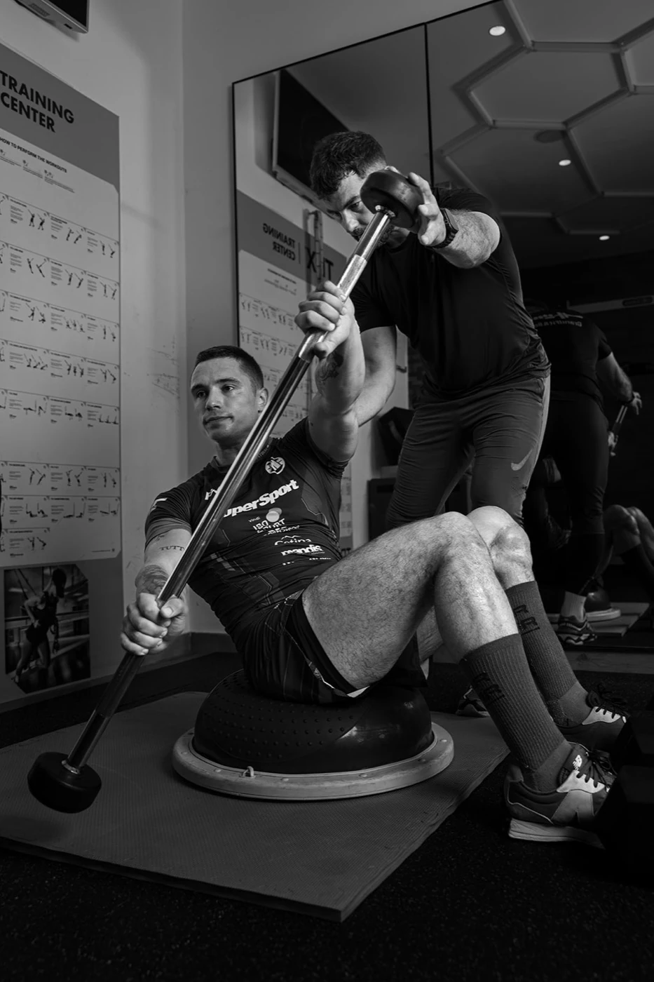 Coaching session — landmine press